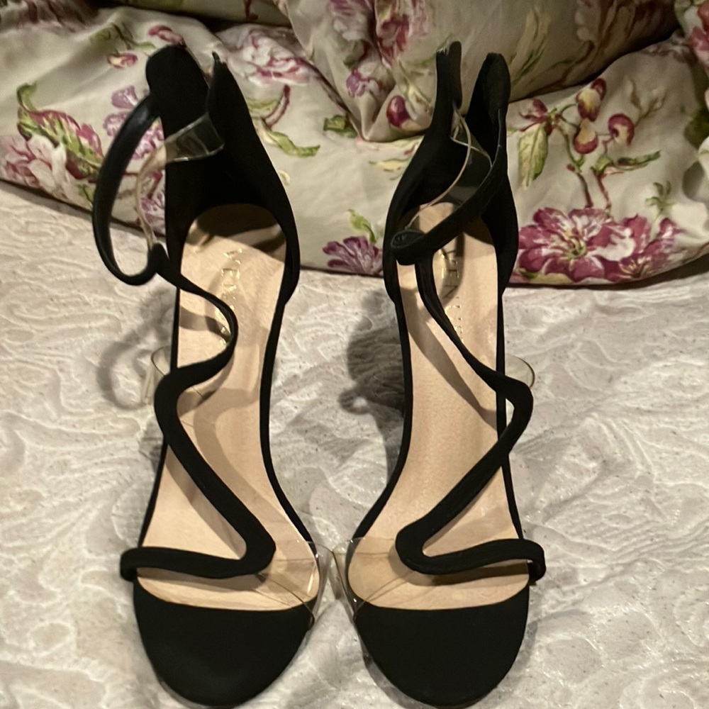 Sexy 4 inch heels Only worn one time. Zip back to close.